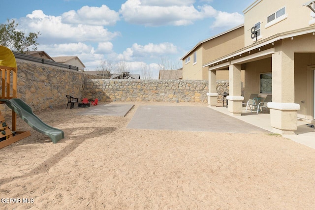 view of yard with a fenced backyard and a patio