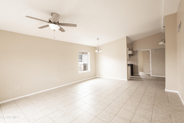 unfurnished room featuring lofted ceiling, ceiling fan with notable chandelier, and light tile patterned floors