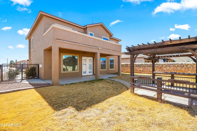 back of property featuring a patio area, a pergola, a balcony, and a lawn