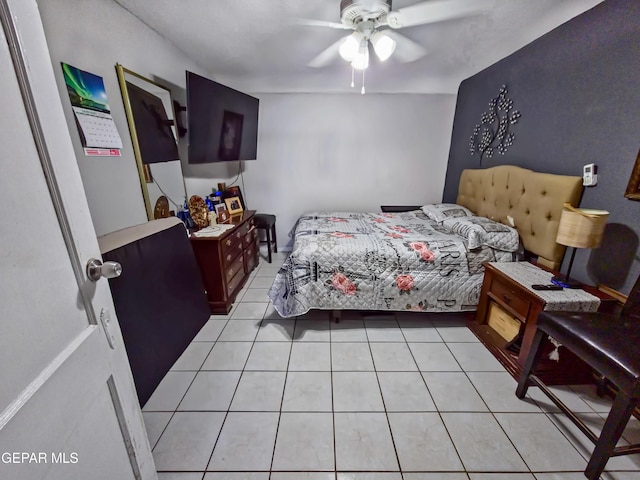 bedroom with light tile patterned floors and ceiling fan