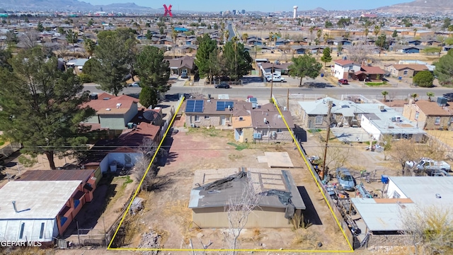 bird's eye view featuring a residential view and a mountain view