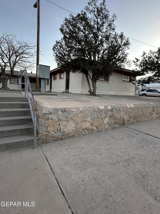 view of front of property featuring a patio