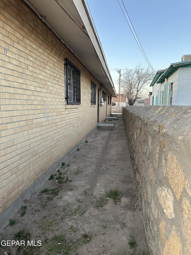 view of home's exterior featuring brick siding