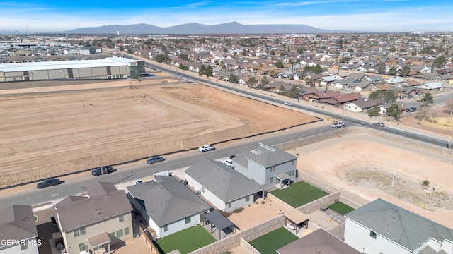 aerial view featuring a residential view and a mountain view