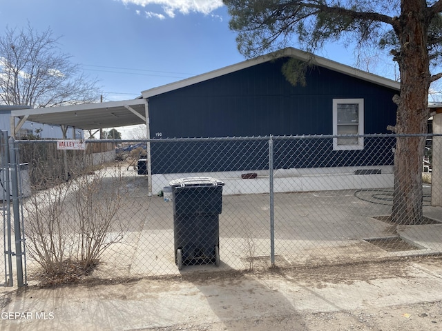 view of property exterior with central air condition unit and a carport