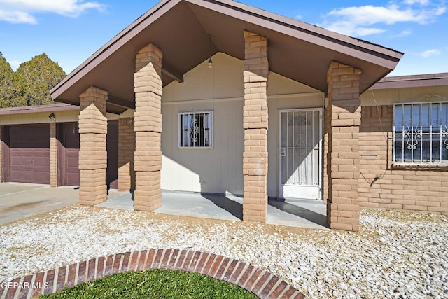 entrance to property featuring a garage