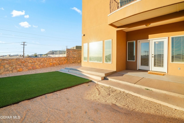 view of yard with fence and a patio