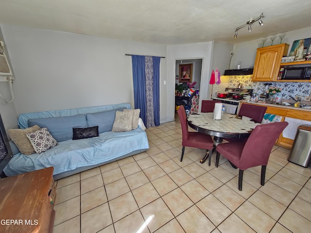 dining area with light tile patterned floors