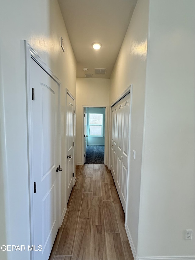 3872 Surmise St, El Paso, TX 79938 - corridor with baseboards and visible vents