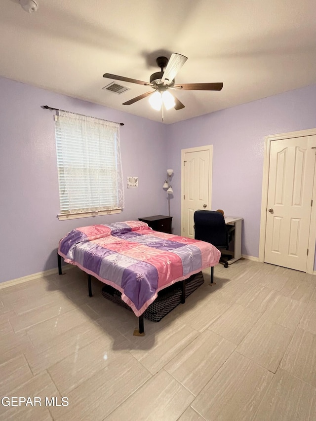 bedroom featuring ceiling fan