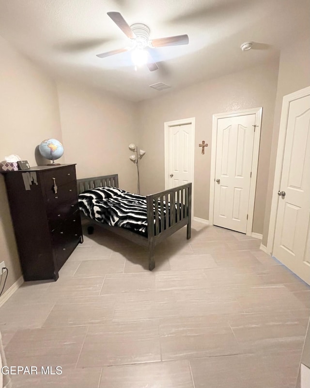 bedroom featuring ceiling fan