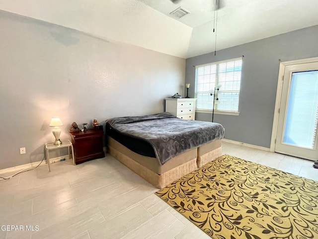 bedroom featuring lofted ceiling, access to outside, and ceiling fan