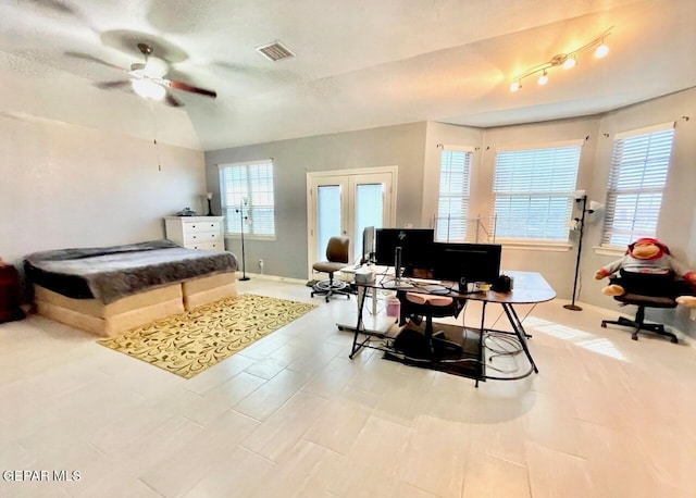 3165 Destiny Point Dr, El Paso, TX 79938 - bedroom featuring visible vents, baseboards, multiple windows, and vaulted ceiling