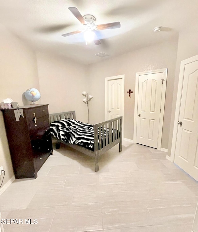 3165 Destiny Point Dr, El Paso, TX 79938 - bedroom with baseboards and a ceiling fan