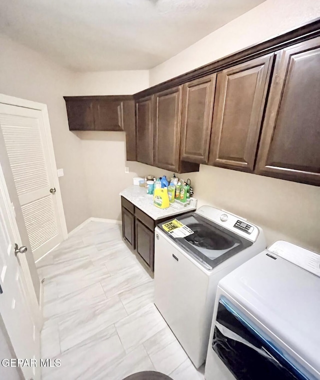 3165 Destiny Point Dr, El Paso, TX 79938 - laundry room with washer and clothes dryer, baseboards, and cabinet space