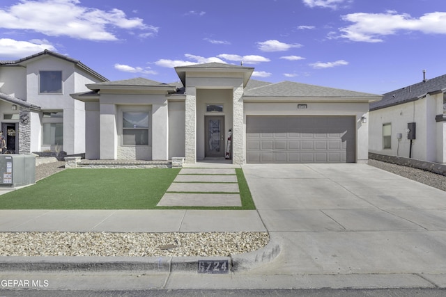 prairie-style house with a garage