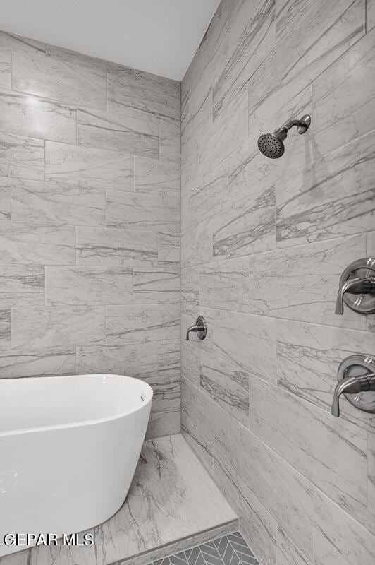 bathroom featuring a tub