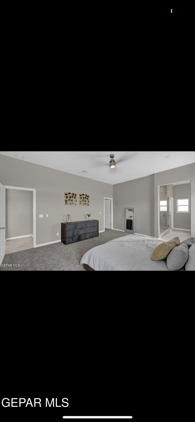 bedroom with ceiling fan and carpet flooring