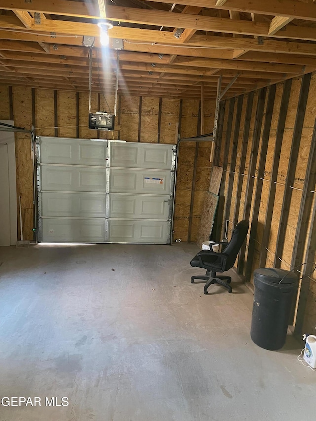 garage featuring a garage door opener