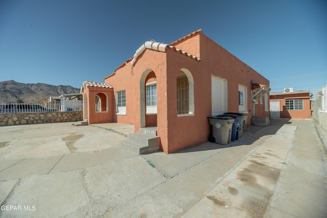 view of front of home with a mountain view