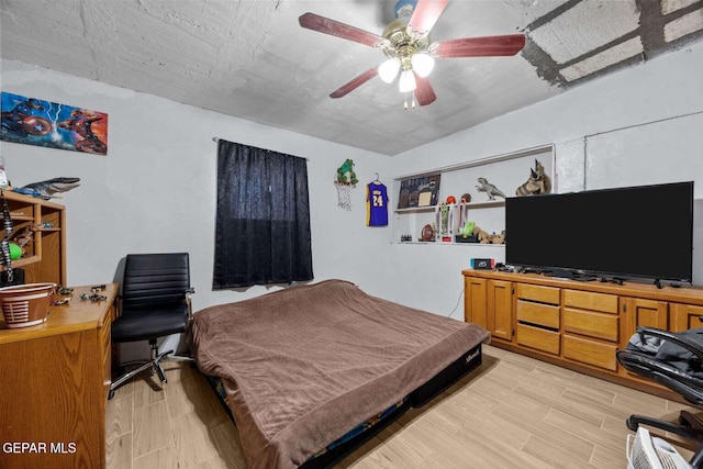 bedroom with vaulted ceiling and ceiling fan