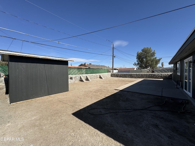 exterior space with a fenced backyard