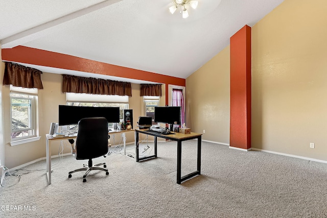 home office featuring carpet floors, baseboards, and vaulted ceiling