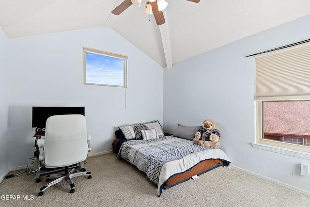 carpeted bedroom featuring lofted ceiling, ceiling fan, and baseboards