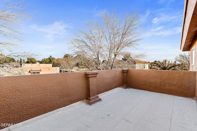 view of patio with a balcony