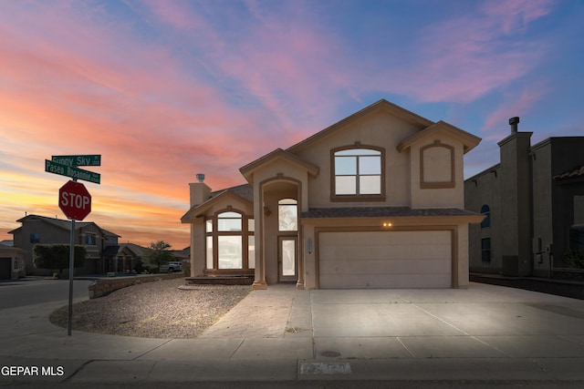 view of front of home with a garage