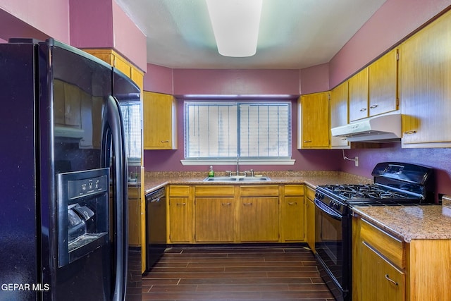 kitchen with sink and black appliances