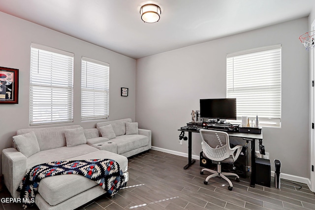 office space featuring wood tiled floor and baseboards