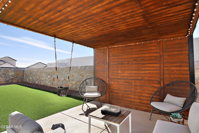 view of patio with a fenced backyard