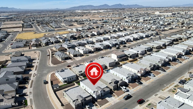 bird's eye view with a residential view and a mountain view