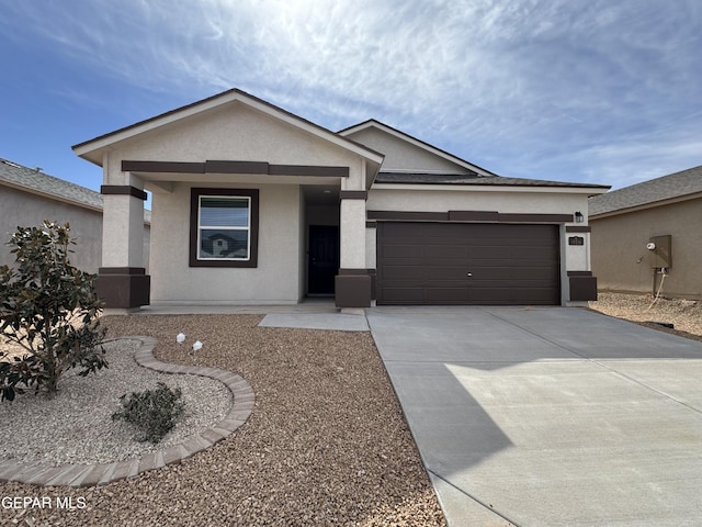 ranch-style home featuring a garage