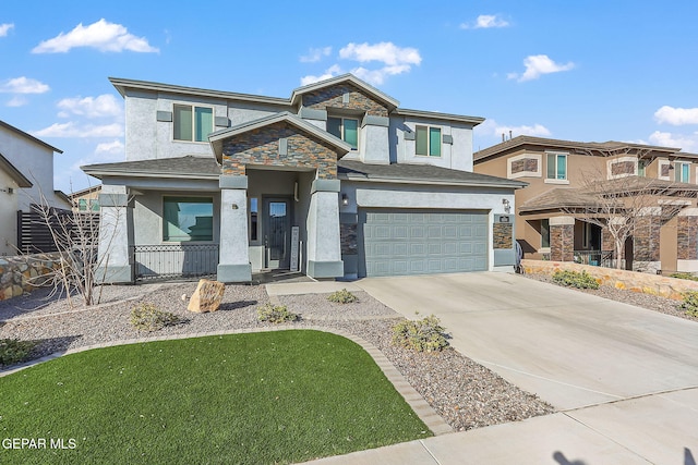 view of front of house with a garage, stone siding, concrete driveway, stucco siding, and a front yard