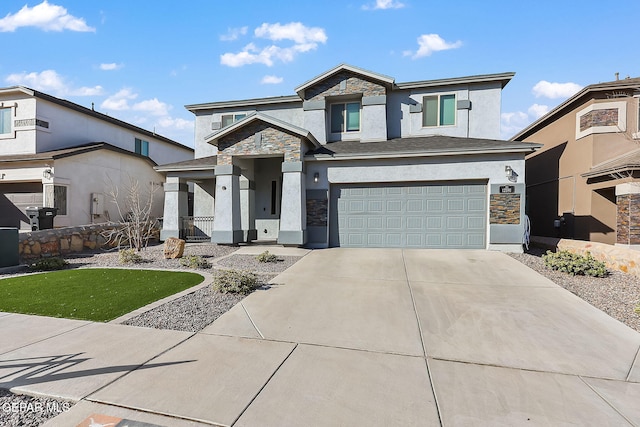 view of front of home featuring a garage, stone siding, concrete driveway, and stucco siding