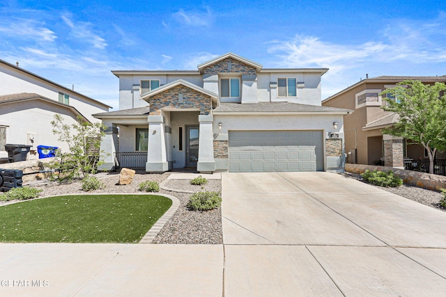view of front facade with stone siding, an attached garage, driveway, and stucco siding