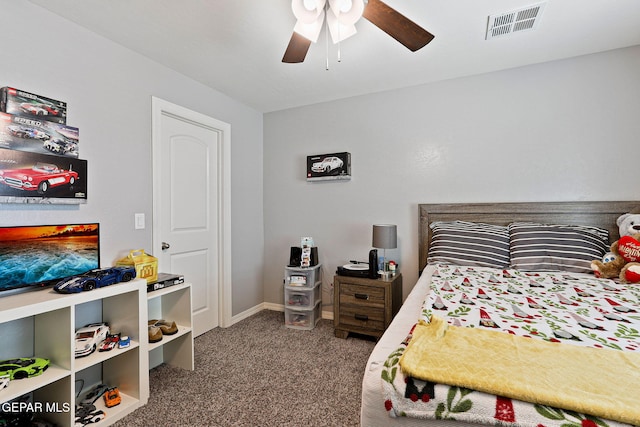 bedroom featuring carpet floors, a ceiling fan, visible vents, and baseboards