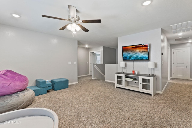 living room with recessed lighting, carpet, baseboards, and ceiling fan