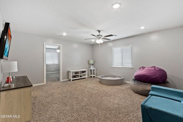 sitting room with recessed lighting, carpet flooring, baseboards, and ceiling fan