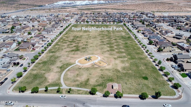 birds eye view of property with a residential view