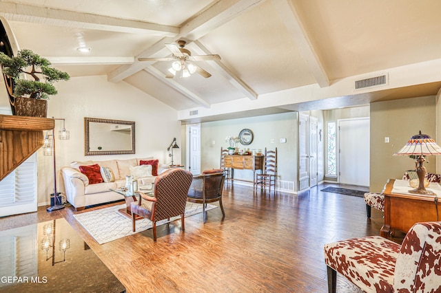 living room with vaulted ceiling with beams, wood finished floors, visible vents, baseboards, and a ceiling fan