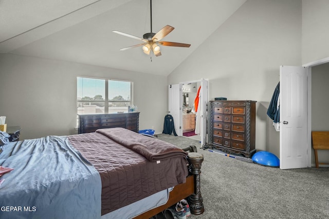 bedroom with ensuite bathroom, carpet floors, ceiling fan, and high vaulted ceiling