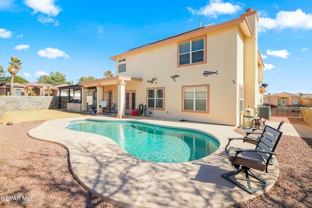 view of pool with a patio, a fenced backyard, a fenced in pool, and central air condition unit