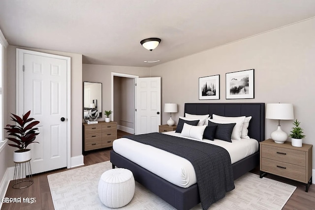 3413 Monroe Ave, El Paso, TX 79930 - bedroom featuring wood finished floors and baseboards