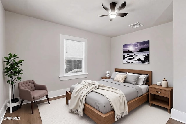 3413 Monroe Ave, El Paso, TX 79930 - bedroom featuring baseboards and wood finished floors