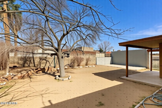 3413 Monroe Ave, El Paso, TX 79930 - view of yard featuring a gate and fence