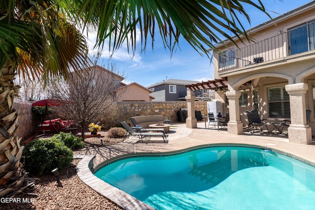 view of swimming pool featuring a fenced in pool, a patio area, a fenced backyard, and a pergola