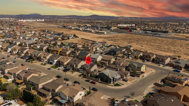 3612 Tierra Calida Dr, El Paso, TX 79938 - aerial view at dusk with a residential view and a mountain view